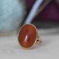 Oval Cabochon Carnelian Solitaire Ring in 9ct Gold