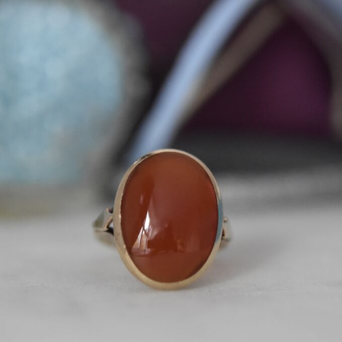 Oval Cabochon Carnelian Solitaire Ring in 9ct Gold