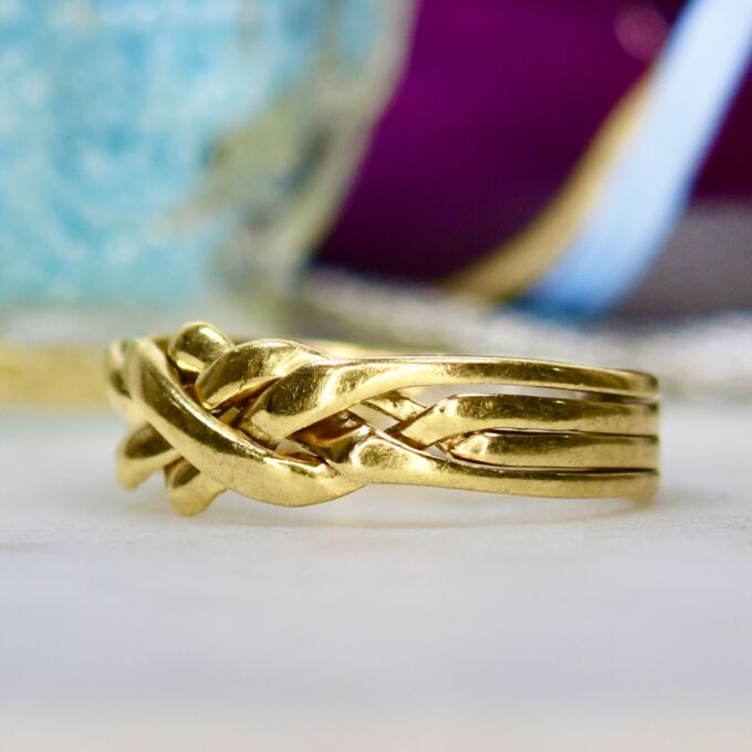 Four Piece Puzzle Ring in 9ct Gold