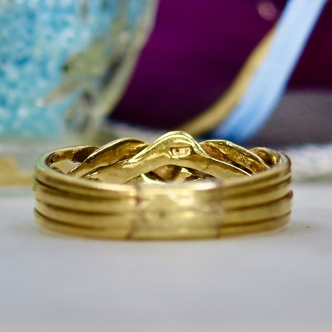 Four Piece Puzzle Ring in 9ct Gold