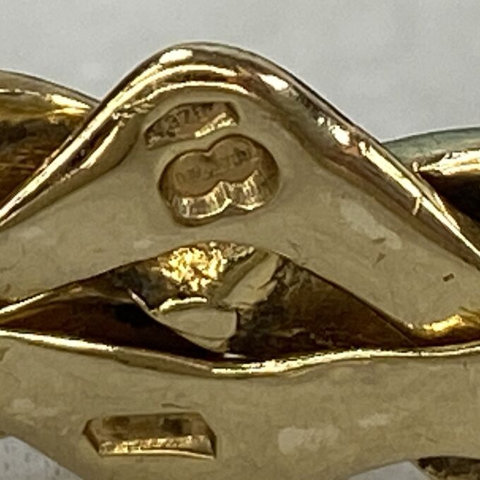 Four Piece Puzzle Ring in 9ct Gold