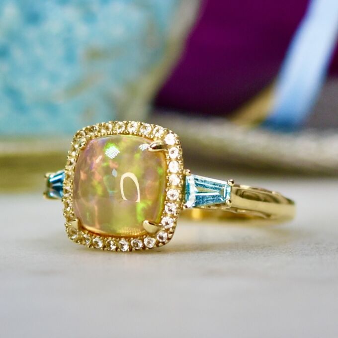Ethiopian Opal and Topaz Ring in 10ct Gold