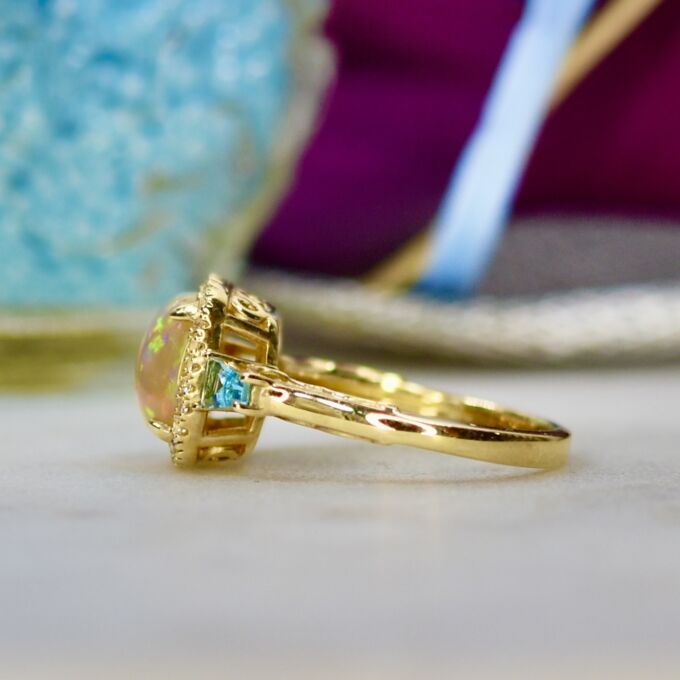 Ethiopian Opal and Topaz Ring in 10ct Gold