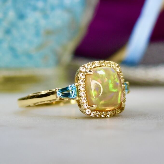 Ethiopian Opal and Topaz Ring in 10ct Gold