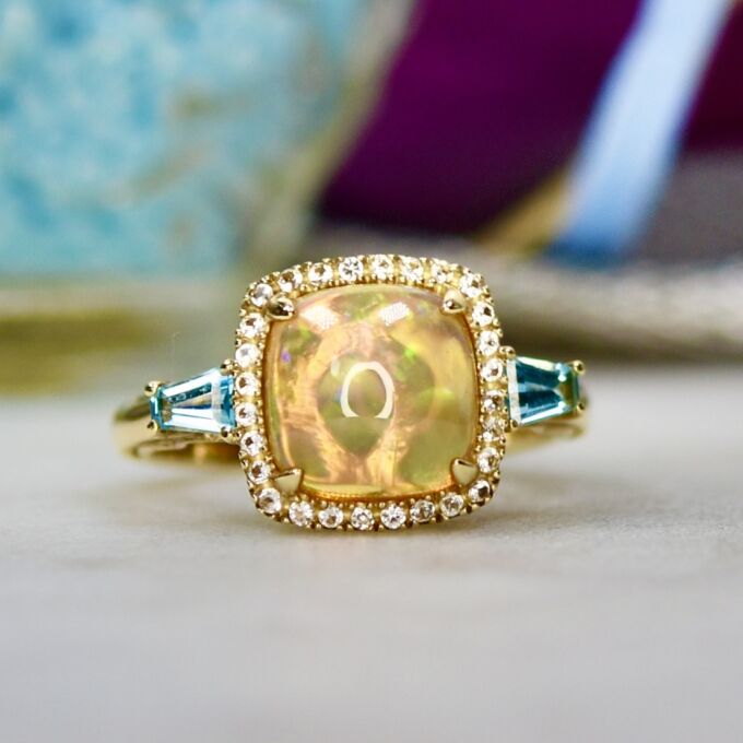 Ethiopian Opal and Topaz Ring in 10ct Gold