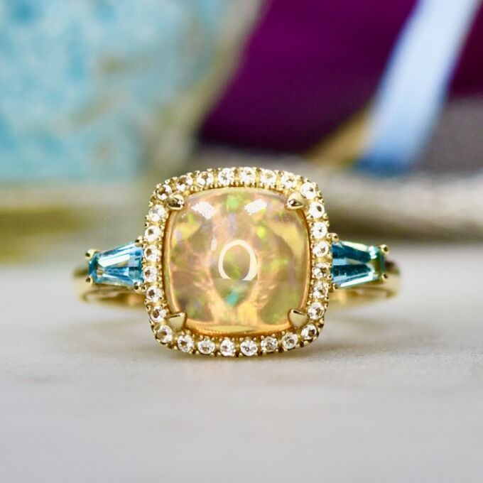 Ethiopian Opal and Topaz Ring in 10ct Gold