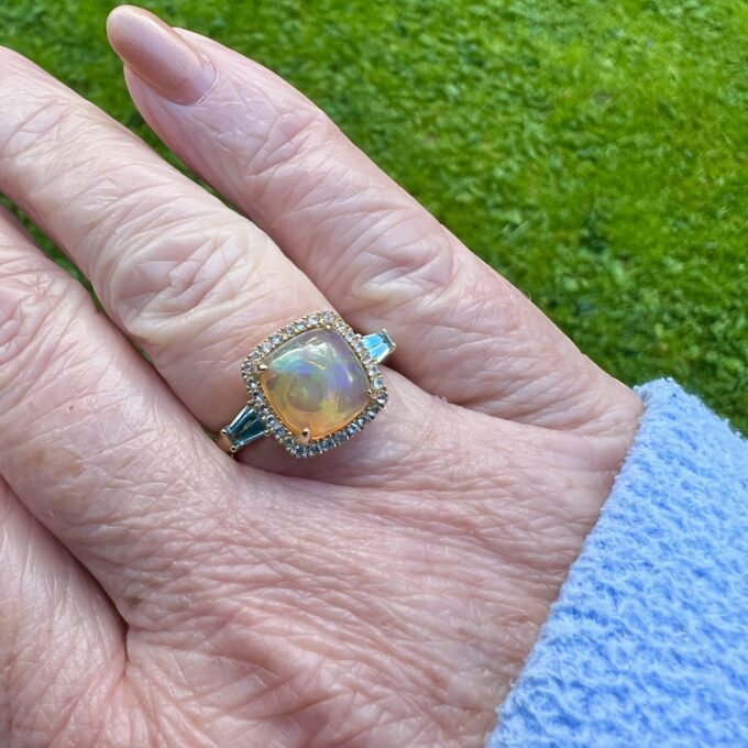 Ethiopian Opal and Topaz Ring in 10ct Gold