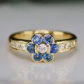 Sapphire and Diamond Flower Design Ring in 18ct Yellow Gold