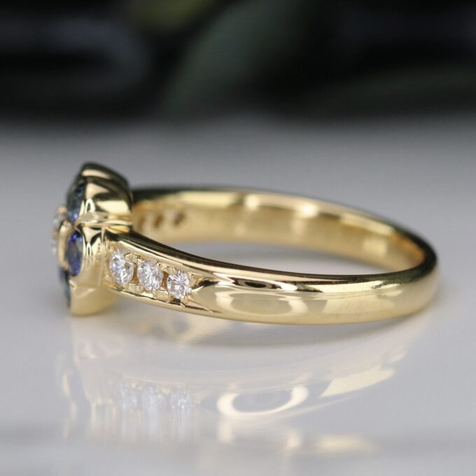 Sapphire and Diamond Flower Design Ring in 18ct Yellow Gold