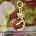 Eagle or Dragon Claw Pendant with Goldstone Ball in 9ct Gold