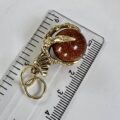 Eagle or Dragon Claw Pendant with Goldstone Ball in 9ct Gold